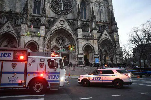 NYPD responds outside of a Manhattan cathedral on December 13th, 2020.
